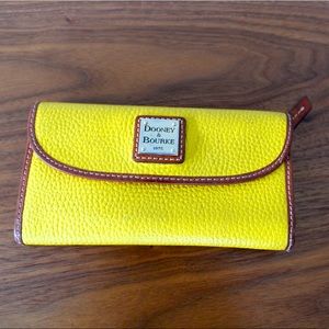 Yellow Dooney and Bourke wallet.